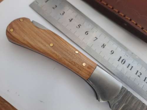 Handmade Damascus steel folding knife w Wooden Handle Scales. New stock !!