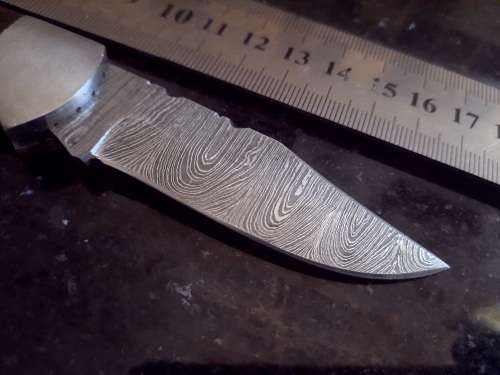 Handmade Damascus steel folding knife w Wooden Handle Scales. Pouch in bad shape, see pictures.