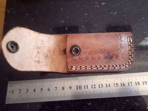 Handmade Damascus steel folding knife w Wooden Handle Scales. Pouch in bad shape, see pictures.