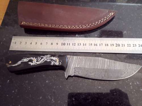 Handmade Damascus steel HUNTING  knife with Bull Horn handle scales.