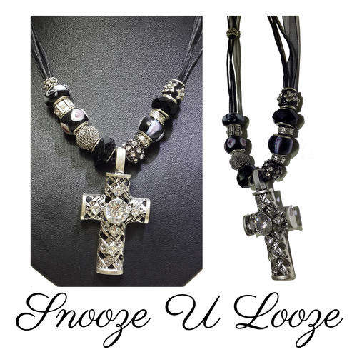 An elegant handmade necklace with Pandora beads, and an exquisite Jewelled Cross pendant.