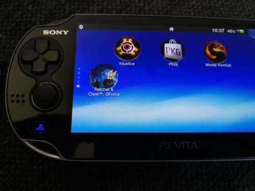 Ps vita slim with 32gig original card. Jailbroken on henkaku.