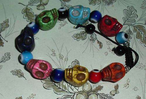 NEW LOOK OF HOWLITE SKULLS - 12mm  EACH  FITS 7 - 11 INCH