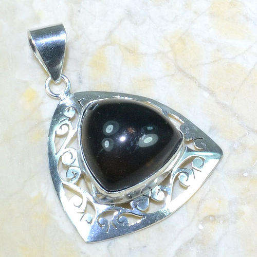 SMOKEY QUARTZ SET IN STERLING SILVER