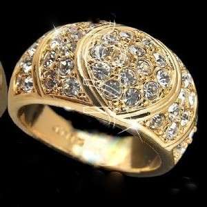 MAGNIFICANT SPARKLE OF MULTIPLE CUBIC ZIRCONIA ON A 10kt GP SOLID RING SIZE 4