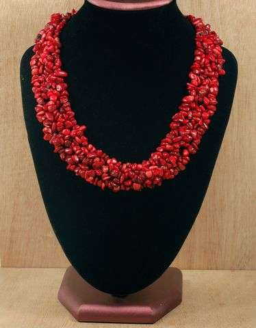 CORAL CROCHETED TOGETHER TO FORM A MAGNIFICANT PIECE OF WORK 18 1/2 INCHES