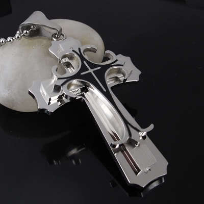 SILVER AND BLACK STAINLESS STEELCROSS  WITH FREE THONG OR  BLACK S.STEEL  BALL CHAIN
