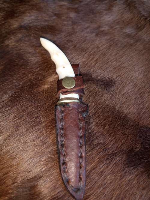 HANDMADE NECK KNIFE ,HANDLE WARTHHOG TOOTH, SS BLADE