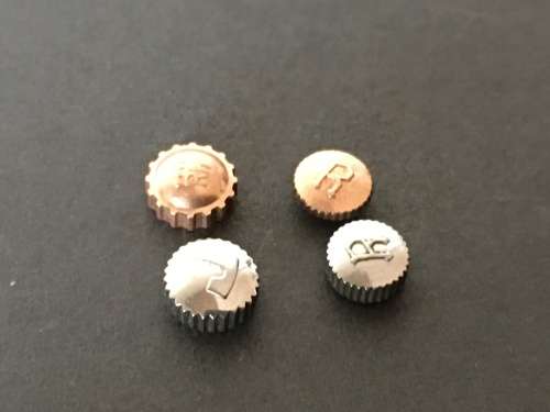 Assortment of 25 signed watch crowns