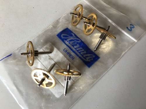 Clock mainspring barrels, center & intermediate wheels
