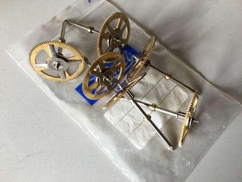 Clock mainspring barrels, center & intermediate wheels
