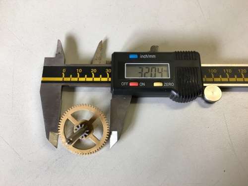 Clock mainspring barrels, center & intermediate wheels