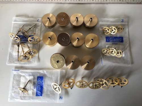 Clock mainspring barrels, center & intermediate wheels