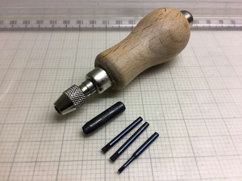 Hand pin vise with screwdriver blades