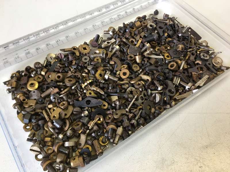 Old clock - screws - nuts - bolts - etc