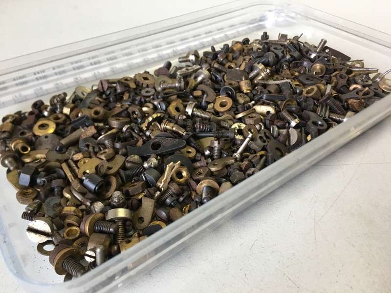 Old clock - screws - nuts - bolts - etc