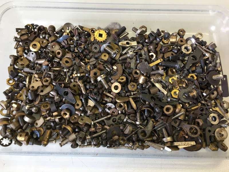 Old clock - screws - nuts - bolts - etc