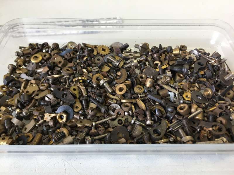 Old clock - screws - nuts - bolts - etc