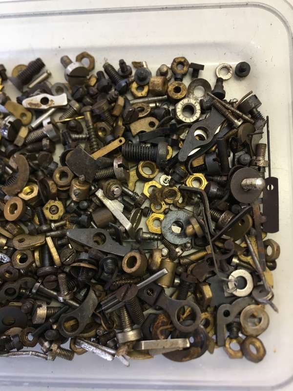 Old clock - screws - nuts - bolts - etc