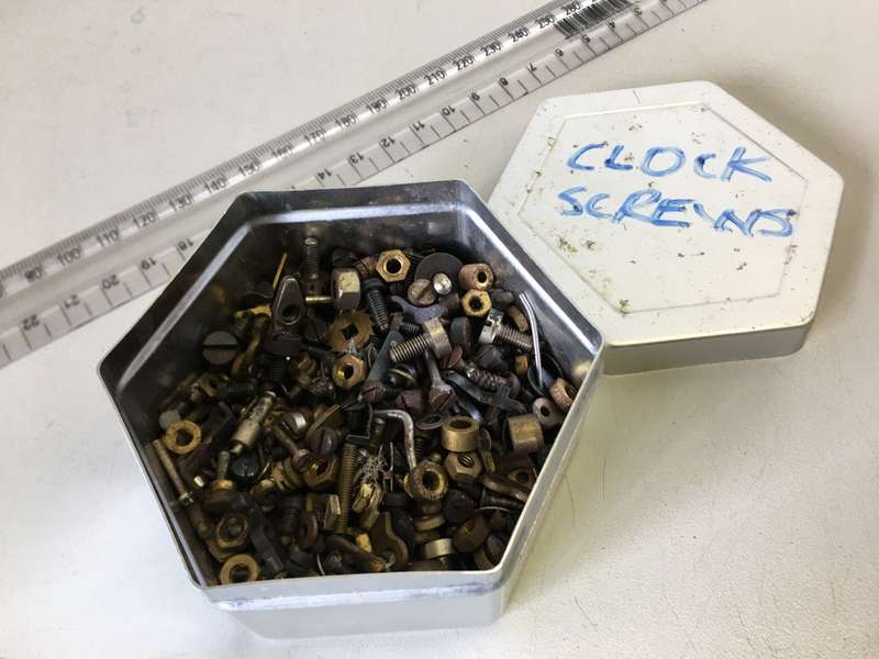 Old clock - screws - nuts - bolts - etc