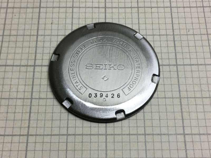 SEIKO 6602 - 7040 case back