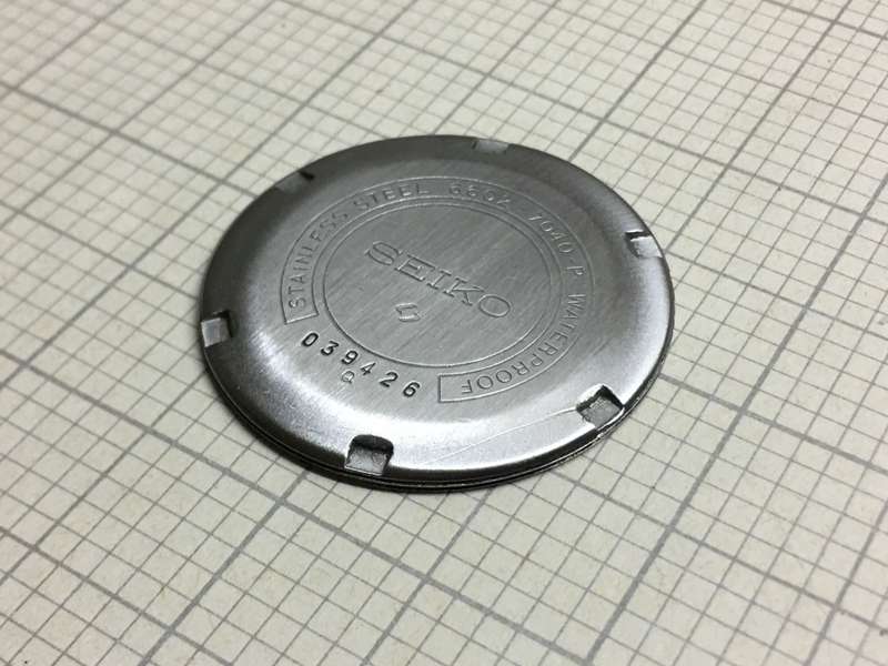 SEIKO 6602 - 7040 case back