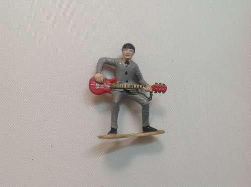 The Beatles LPs and set of figurines collection.