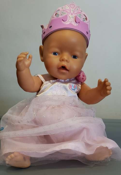 Baby Born Doll with Princess dress and crown. Comes with Additional clothing - 40 Pieces