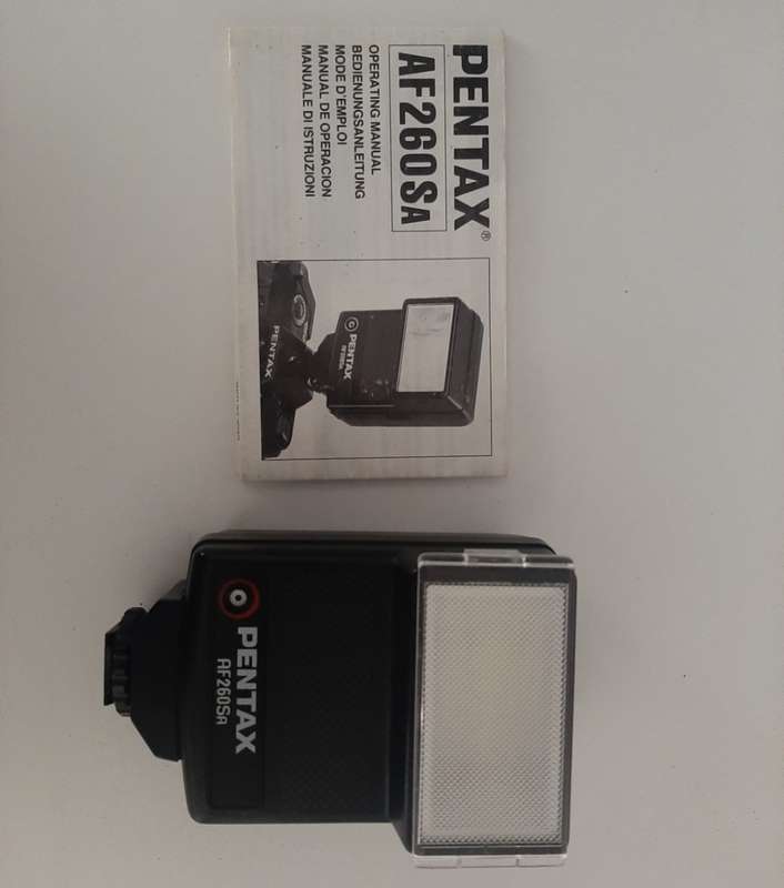 Pentax K100D - DSLR Camera - Lens + Flash included.
