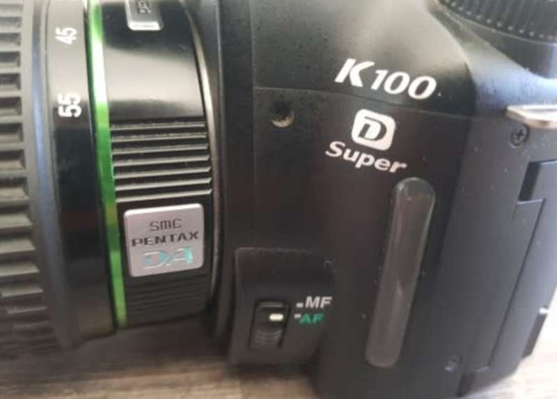 Pentax K100D - DSLR Camera - Lens + Flash included.