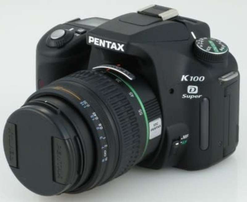 Pentax K100D - DSLR Camera - Lens + Flash included.