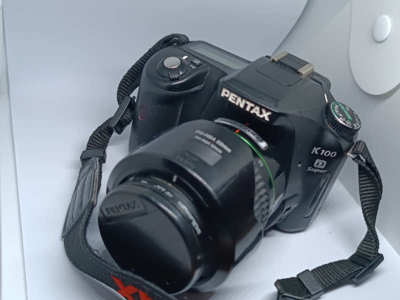 Pentax K100D - DSLR Camera - Lens + Flash included.