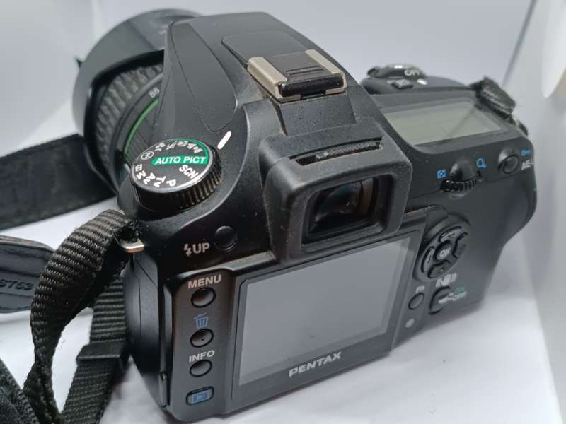 Pentax K100D - DSLR Camera - Lens + Flash included.