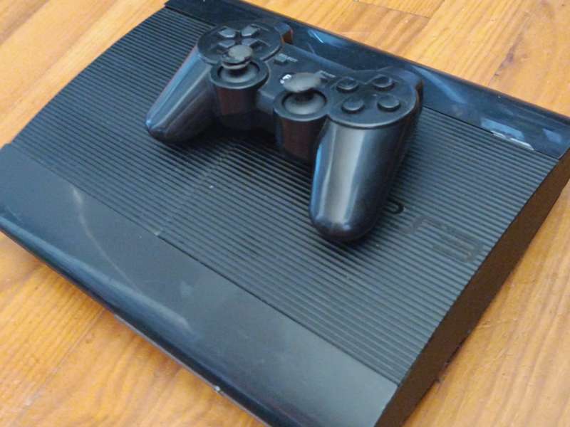 Sony PlayStation 3 superslim Console 12GB (suggest getting a new controller)