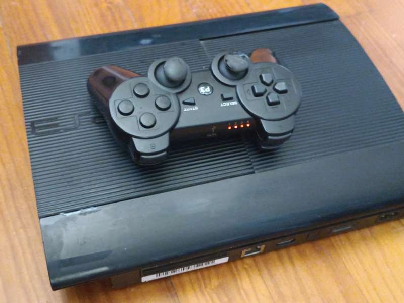 Sony PlayStation 3 superslim Console 12GB (suggest getting a new controller)