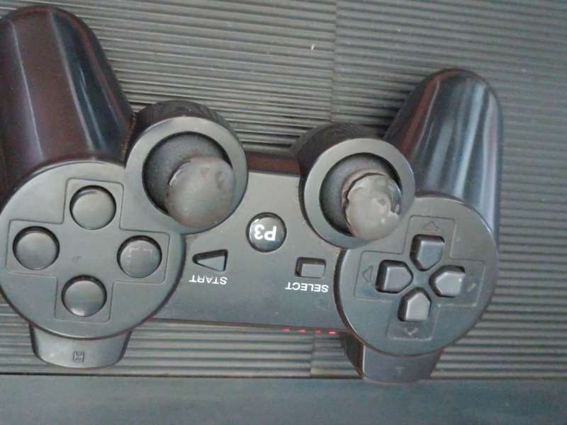 Sony PlayStation 3 superslim Console 12GB (suggest getting a new controller)