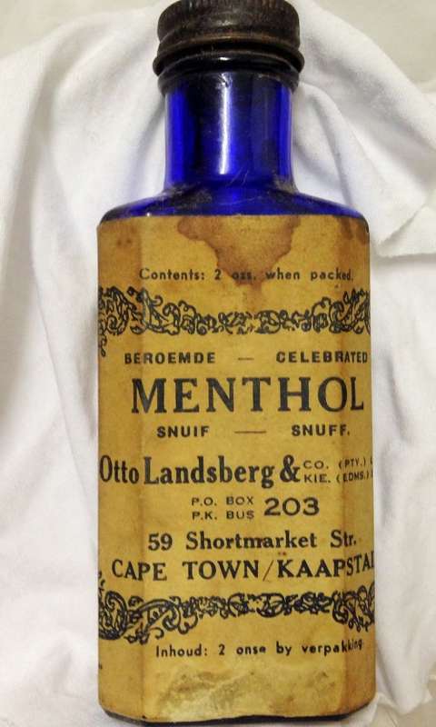 SNUFF`OTTO LANDSBERG & CO (PTY) LTD` MENTHOL SNUFF bottle-SMALL AMOUNT STILL IN cobolt blue BOTTLE