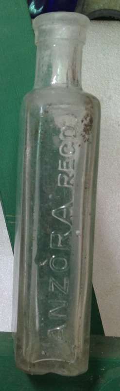 Dump Bottle of the 19th Century*PICTORIAL EMBOSSED`ANZORA`REDG. c 1915 advertisedmasters of the hair