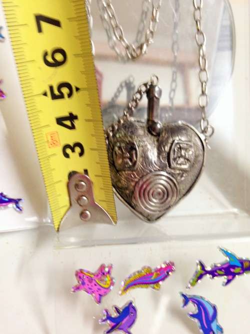 Perfume flask on chain has Stopper and Dauber
