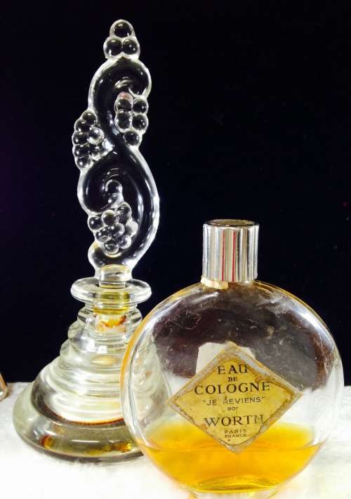 Perfume bottles - 2 empty  Figural top +1930`s *Worth  Perfume bottle some Contents