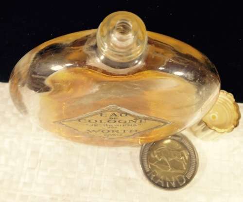 Perfume bottles - 2 empty  Figural top +1930`s *Worth  Perfume bottle some Contents