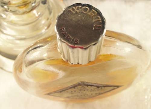 Perfume bottles - 2 empty  Figural top +1930`s *Worth  Perfume bottle some Contents