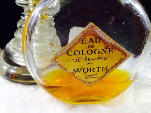 Perfume bottles - 2 empty  Figural top +1930`s *Worth  Perfume bottle some Contents