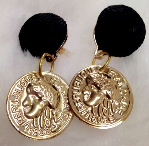 EARRINGS - VTG tone  metal  disk mans head Republic Fracaise