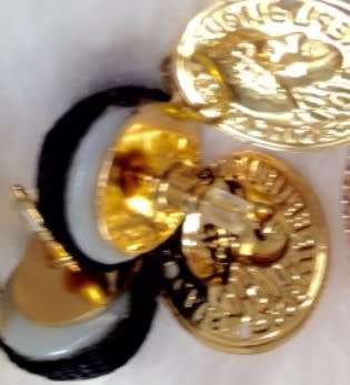 EARRINGS - VTG tone  metal  disk mans head Republic Fracaise