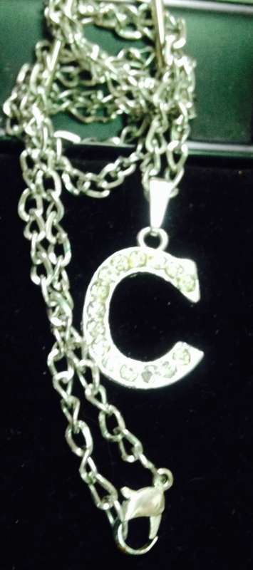 Necklace C has pave crystal silver tone metal Look at my buy now - No Waiting