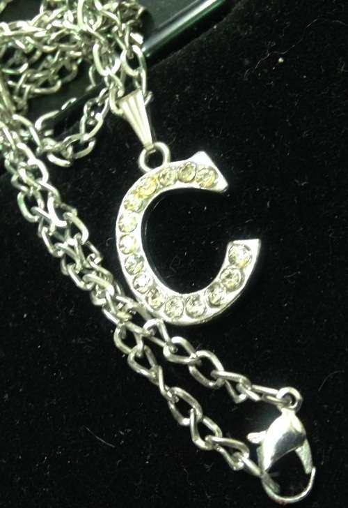 Necklace C has pave crystal silver tone metal Look at my buy now - No Waiting