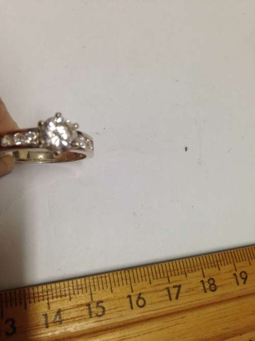 stamped 925 NV 9  * Sterling Nevada Silver mine size 9l  clear stone big middle each side 3 small