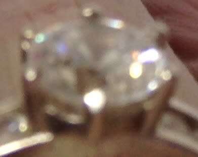 stamped 925 NV 9  * Sterling Nevada Silver mine size 9l  clear stone big middle each side 3 small