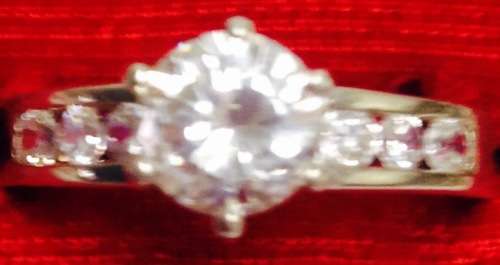 stamped 925 NV 9  * Sterling Nevada Silver mine size 9l  clear stone big middle each side 3 small